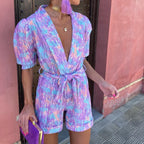 Short Jumpsuit for Women with Puff Sleeves and Tied Belt