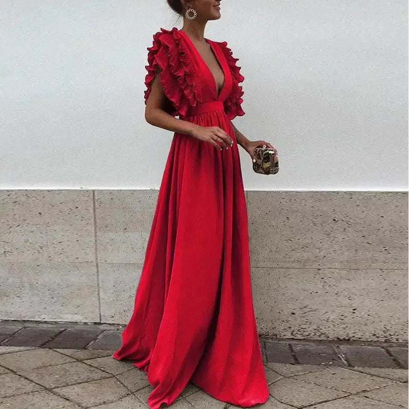 Long fluid women's dress with ruffled sleeves and plunging neckline