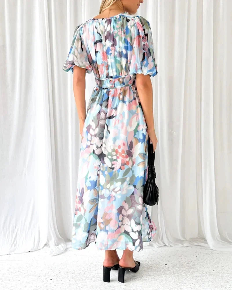 Long floral dress with long sleeves and V-neck for spring weddings