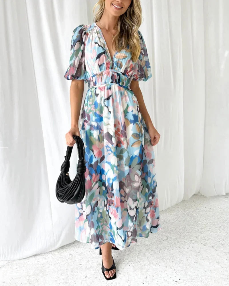 Long floral dress with long sleeves and V-neck for spring weddings