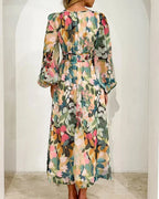 Long floral dress with long sleeves and V-neck for spring weddings
