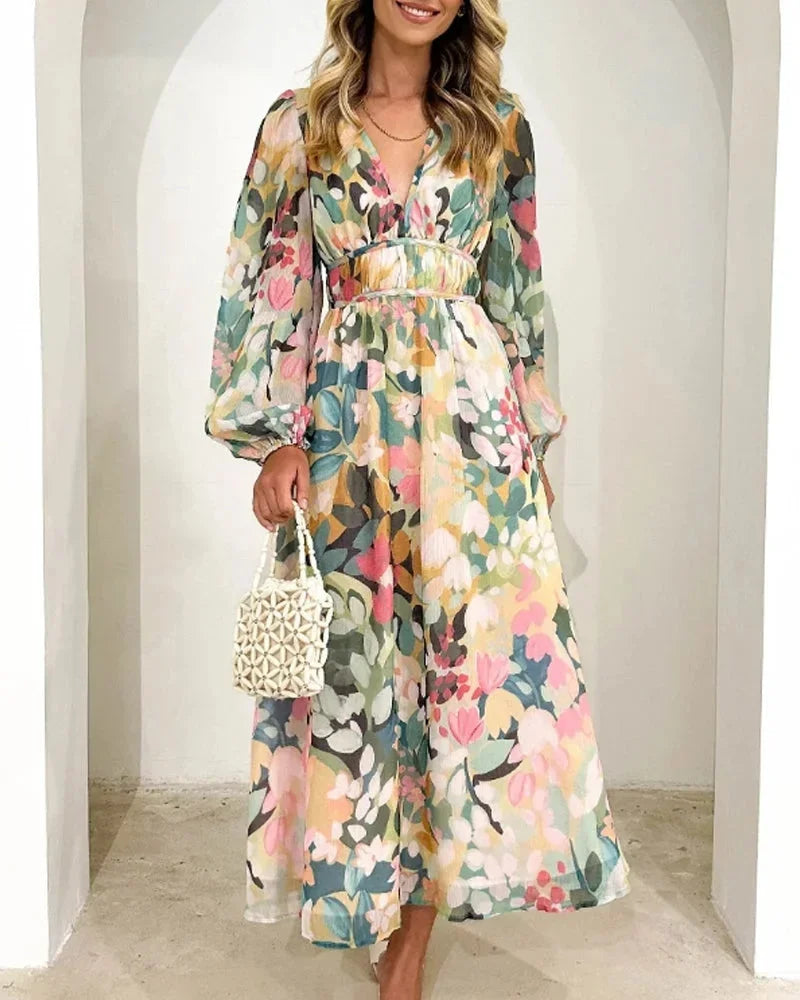 Long floral dress with long sleeves and V-neck for spring weddings