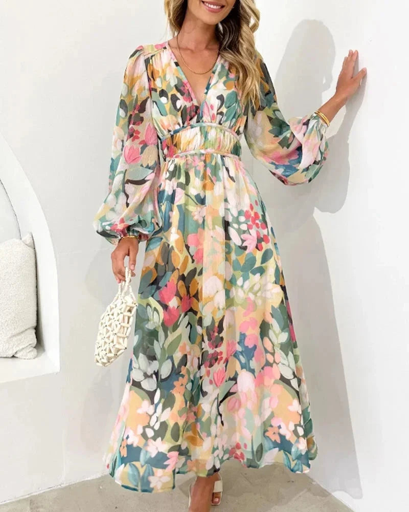 Long floral dress with long sleeves and V-neck for spring weddings
