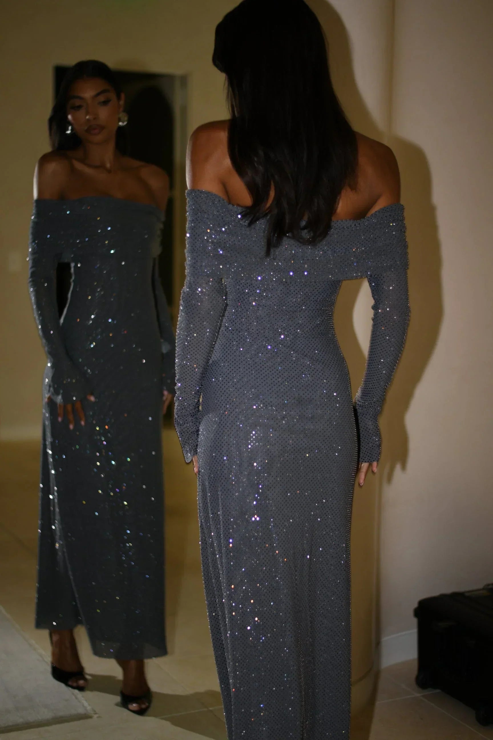 Long Shimmering Dress with Long Sleeves and Off-Shoulder Design