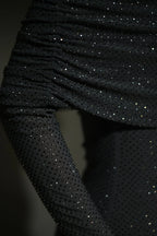 Long Shimmering Dress with Long Sleeves and Off-Shoulder Design