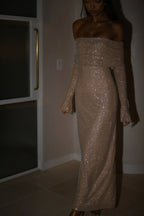 Long Shimmering Dress with Long Sleeves and Off-Shoulder Design