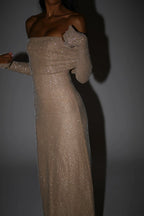 Long Shimmering Dress with Long Sleeves and Off-Shoulder Design