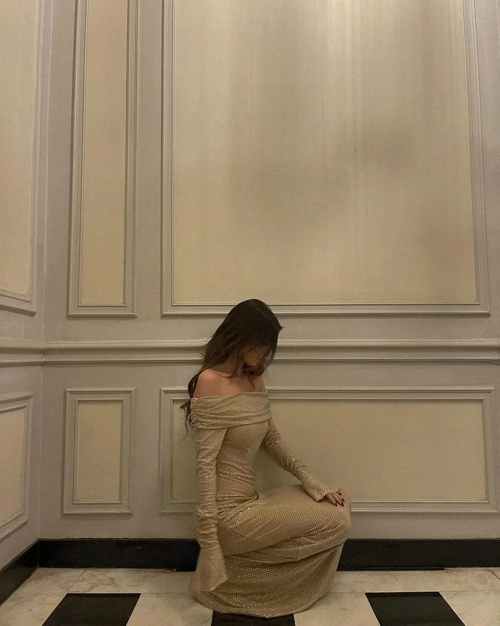 Long Shimmering Dress with Long Sleeves and Off-Shoulder Design
