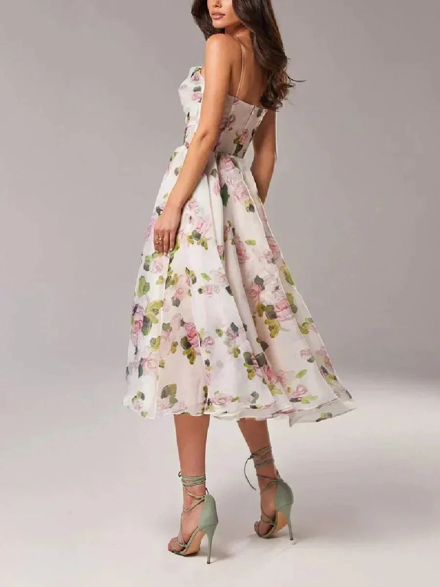 Fluid midi dress for women with fine straps and floral print