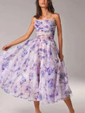 Fluid midi dress for women with fine straps and floral print
