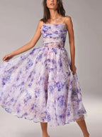 Fluid midi dress for women with fine straps and floral print