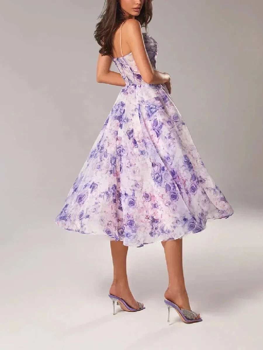 Fluid midi dress for women with fine straps and floral print