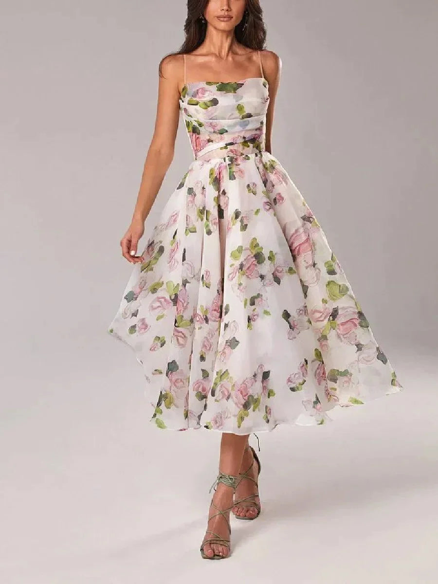 Fluid midi dress for women with fine straps and floral print
