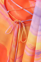 Short Women's Dress in Gradient Orange with Asymmetric Halter Neck