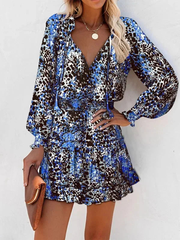 Short women's dress with ruffles and various prints