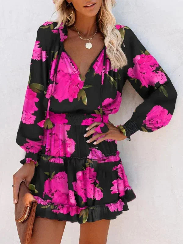 Short women's dress with ruffles and various prints