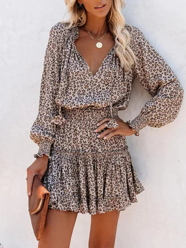 Short women's dress with ruffles and various prints