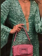 Short women's shimmering dress with plunging neckline and flared sleeves
