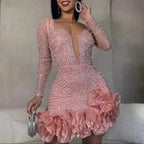 Short evening dress with plunging neckline and long sleeves