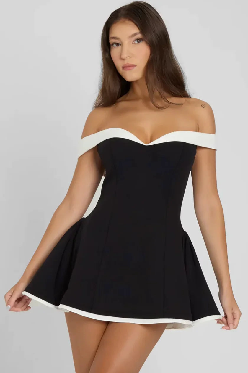Short black dress with off-the-shoulder design and white trim