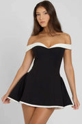 Short black dress with off-the-shoulder design and white trim